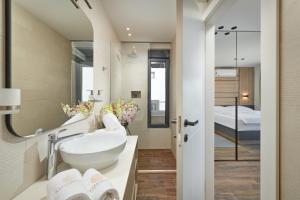 Posteľ alebo postele v izbe v ubytovaní Sun Spalato Villas