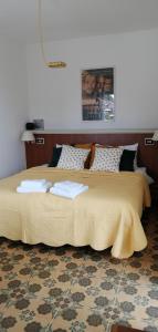 Posteľ alebo postele v izbe v ubytovaní Villa Magnolia BB, Lago Maggiore (Massino Visconti, Italy)