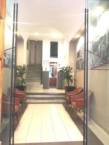 Lobby alebo recepcia v ubytovaní Rome Travellers Hotel