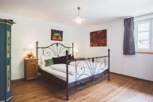 Postel nebo postele na pokoji v ubytování Chalet am Sonnenhang