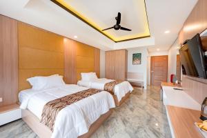 Dedanau Hotel客房内的一张或多张床位