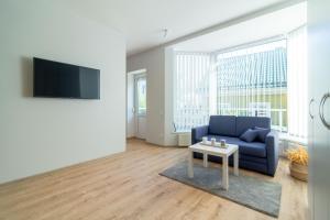 Μια τηλεόραση ή/και κέντρο ψυχαγωγίας στο V36 Apartments