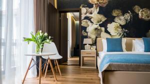 Postel nebo postele na pokoji v ubytování Redling Hotel