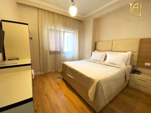 Postel nebo postele na pokoji v ubytování Hotel Vila e Arte City Center