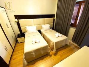Postel nebo postele na pokoji v ubytování Hotel Vila e Arte City Center