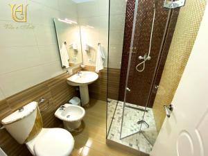 Koupelna v ubytování Hotel Vila e Arte City Center
