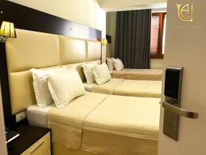 TV a/nebo společenská místnost v ubytování Hotel Vila e Arte City Center