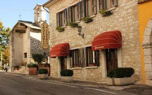 Fotografie z fotogalerie ubytování Albergo Speranza Spiazzi di Monte Baldo v destinaci Spiazzi Di Caprino