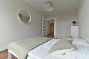 Posteľ alebo postele v izbe v ubytovaní LTC Apartments Silva