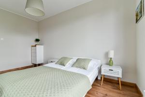 Posteľ alebo postele v izbe v ubytovaní LTC Apartments Silva