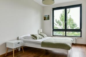 Posteľ alebo postele v izbe v ubytovaní LTC Apartments Silva