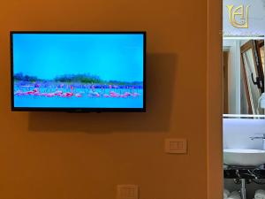 TV a/nebo společenská místnost v ubytování Hotel Vila e Arte City Center