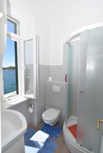 Ванная комната в Apartmani Rina