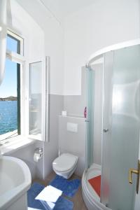 Ванная комната в Apartmani Rina
