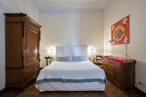 Letto o letti in una camera di Flat Two