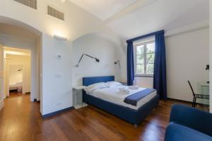 Posteľ alebo postele v izbe v ubytovaní JOIVY Villa with Splendid View and Private Garden in Mulinetti