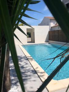 The swimming pool at or close to HOTEL ERMITAGE