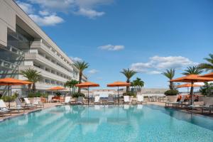 
a large swimming pool in a hotel room at Hyatt Regency Orlando International Airport Hotel in Orlando
