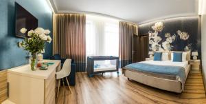 Postel nebo postele na pokoji v ubytování Redling Hotel