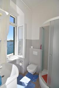Ванная комната в Apartmani Rina
