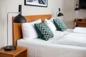 Postel nebo postele na pokoji v ubytování Comfort Hotel tom Kyle