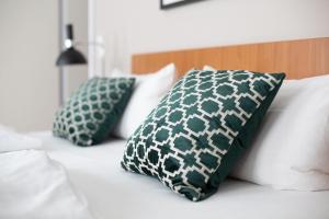 Postel nebo postele na pokoji v ubytování Comfort Hotel tom Kyle