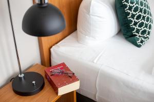 Postel nebo postele na pokoji v ubytování Comfort Hotel tom Kyle