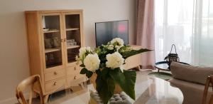 Telewizja i/lub zestaw kina domowego w obiekcie Apartamento Lujo Duna Beach