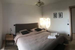 Letto o letti in una camera di Villa Fogata à l'Ile Rousse vue mer exceptionnelle