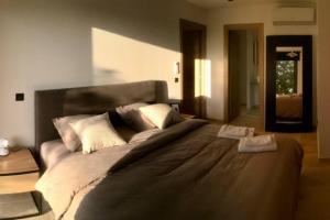 Letto o letti in una camera di Villa Fogata à l'Ile Rousse vue mer exceptionnelle