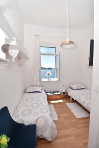 Кровать или кровати в номере Apartmani Rina