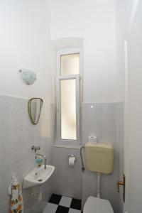 Ванная комната в Apartmani Rina
