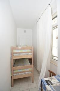 Кровать или кровати в номере Apartmani Rina