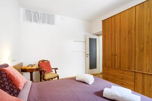 Lova arba lovos apgyvendinimo įstaigoje Casa Carla - cozy Apartment with garden -8 km to Bellagio!