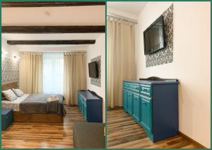 a bedroom with a bed and a tv on a wall at Old Town Studio Apartment in Toruń