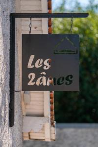 a sign on the side of a house that says los angeles at Les deux anes in Veuves