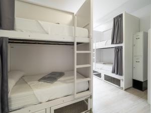 Postel nebo postele na pokoji v ubytování El Hostel & CO