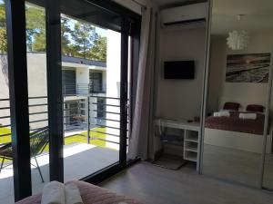 Posteľ alebo postele v izbe v ubytovaní Aprum Apartments 12C