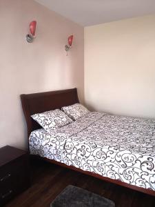 Ein Bett oder Betten in einem Zimmer der Unterkunft Hotel Edem