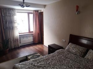 Ein Bett oder Betten in einem Zimmer der Unterkunft Hotel Edem