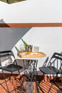 Nápoje v ubytování Apartamento Deluxe Terrace. Alameda