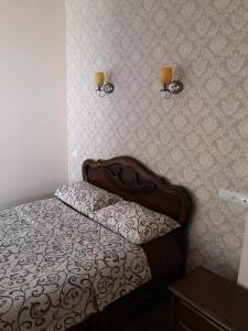 Ein Bett oder Betten in einem Zimmer der Unterkunft Hotel Edem