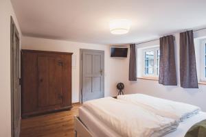 Postel nebo postele na pokoji v ubytování Chalet am Sonnenhang