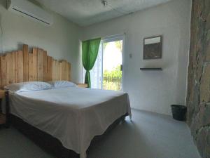 Postel nebo postele na pokoji v ubytování Bermejo Hostel