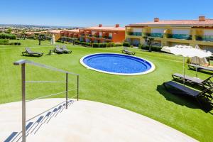 Utsikt mot bassenget på Casa Mapie - Boavista Resort eller i nærheten