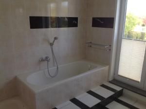 Ein Badezimmer in der Unterkunft Haus Annelie FEWO 3 EG/OG