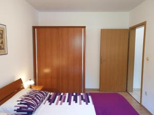 Postel nebo postele na pokoji v ubytování Apartments Coral, Klimno, island Krk