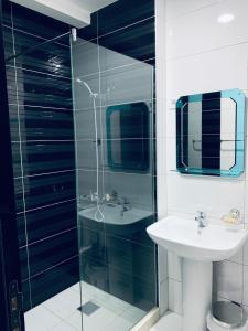 A bathroom at Seafront Apartments