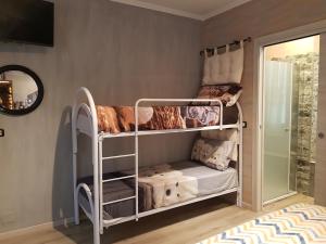 Postel nebo postele na pokoji v ubytování B&B Le Palme