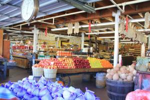 a store filled with lots of fruits and vegetables at Casa de Fruta Inn in Hollister
